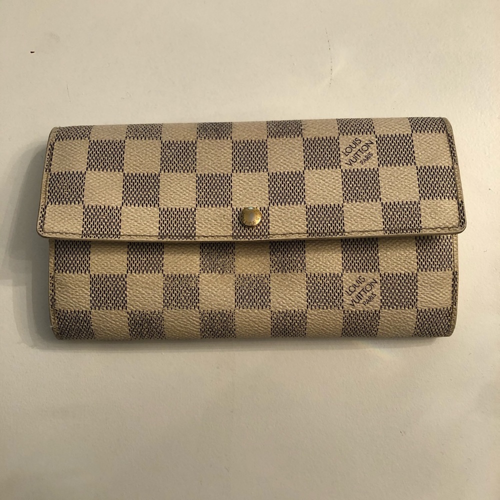 Authentic Louie Vuitton Damier Azur wallet.